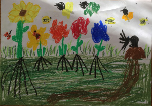 Łąka- praca plastyczna wykonana przez Jakuba. Przedstawia trawę, czerwone, żółte i niebieskie kwiaty, nad nimi fruwają owady, z prawej strony kartki widać kretowisko, a w nim kreta.